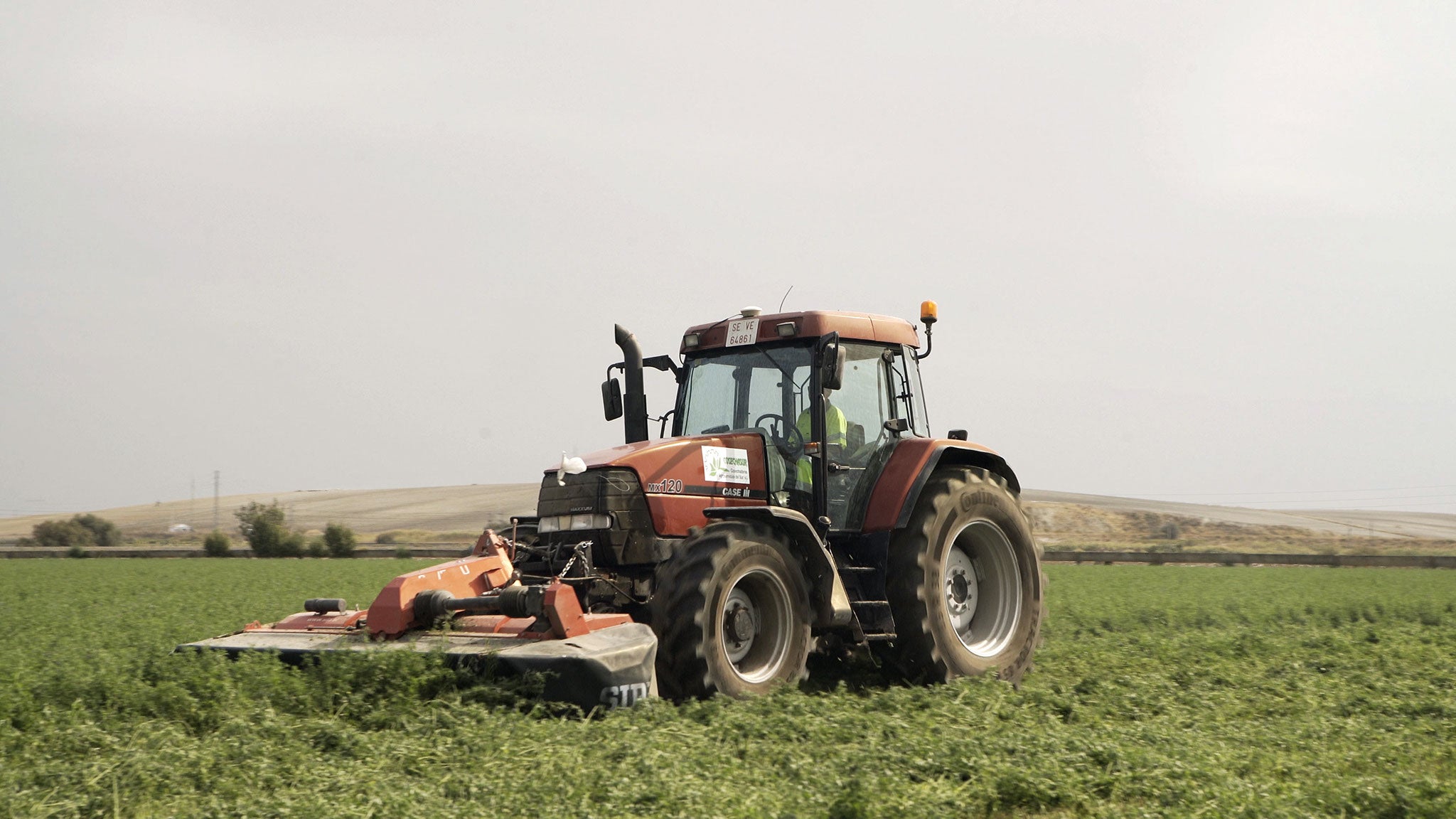 Tractor rides on the field