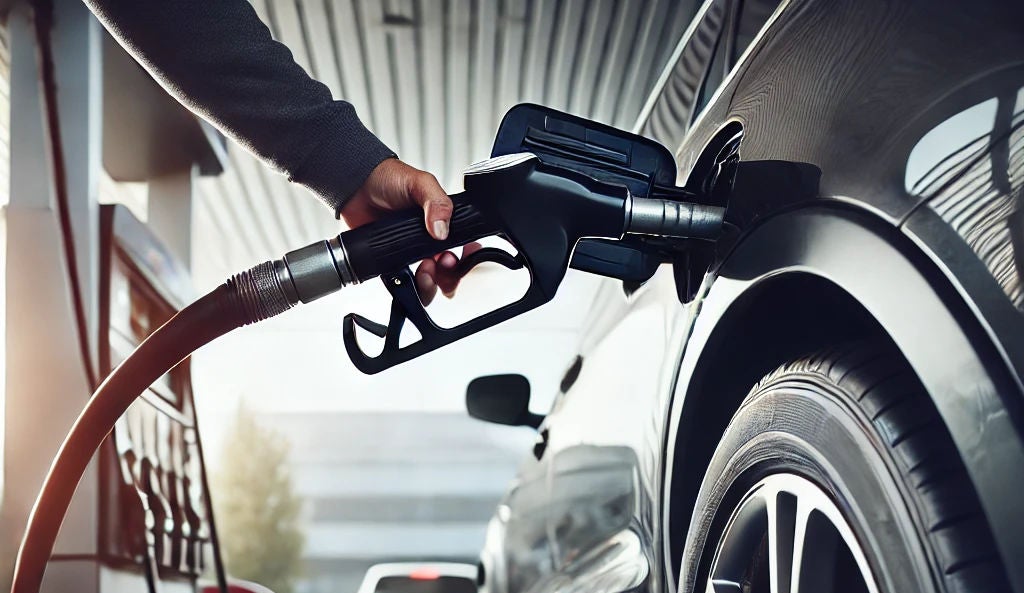 Man refuels his car
