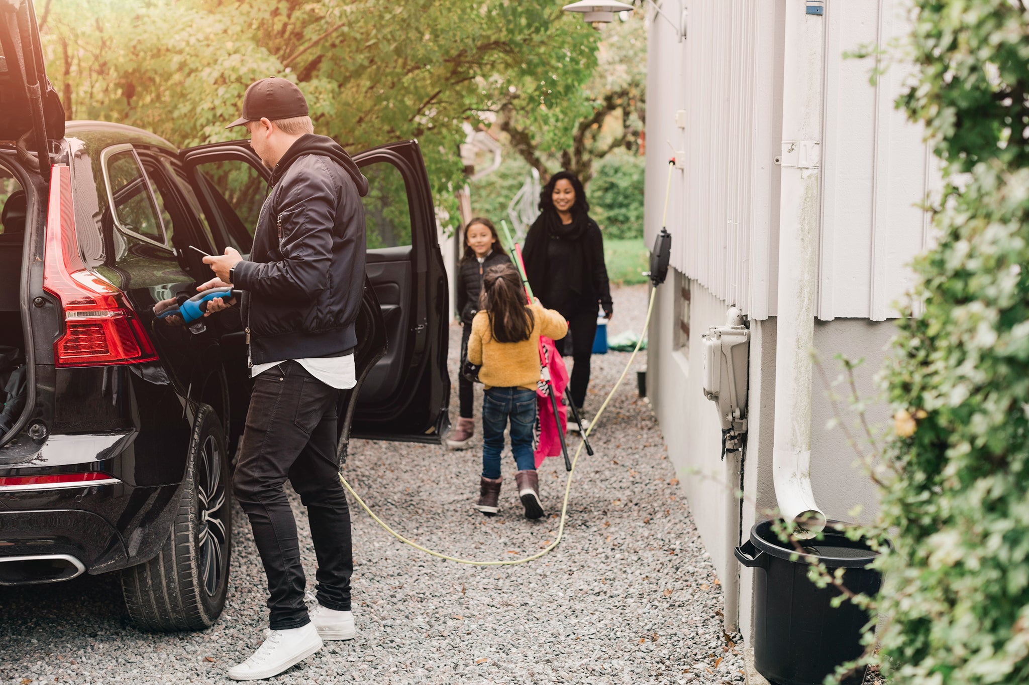 A family is prepairing their car for the next trip.