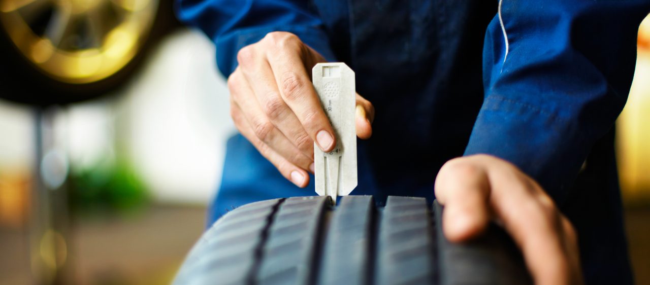 The importance of tread depth Mechanic checks tread depth